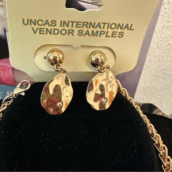 Authentic Louis Vuitton lock and key #308
with unbranded chain and earrings. - Picture 3 of 5